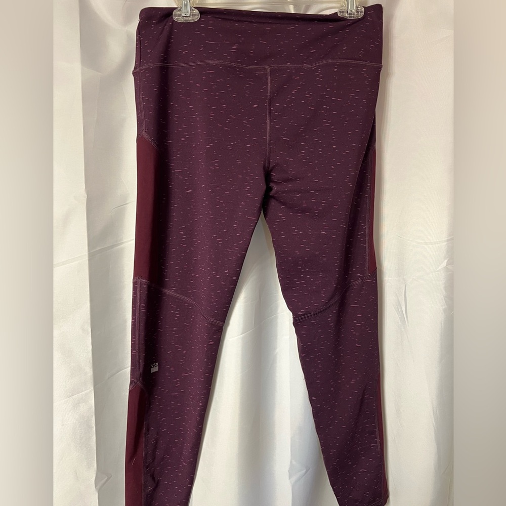 Victoria’s Secret burgundy leggings with pinkish flecks. Size large. EUC.